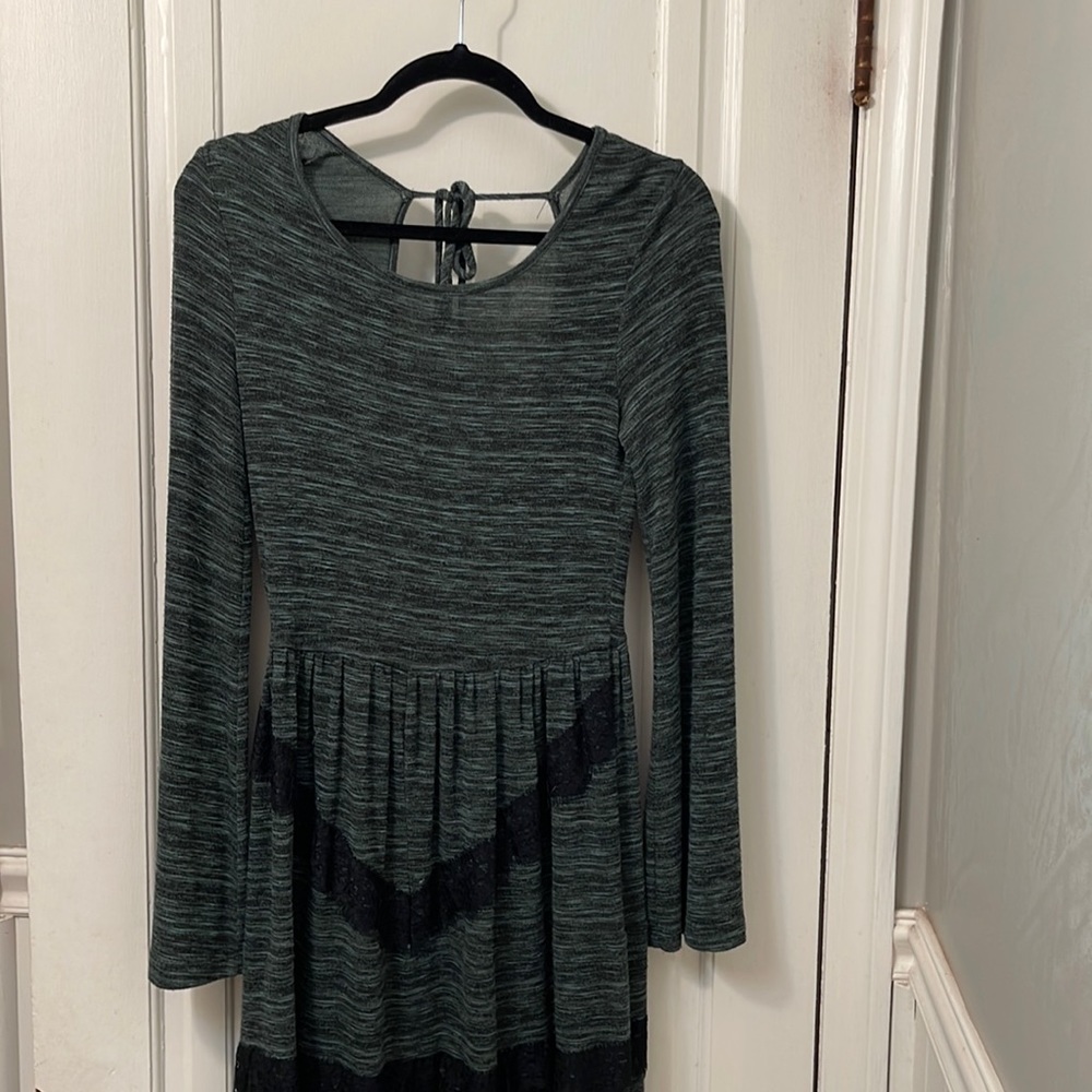 Boutique Dress. Turquoise with black lace detail.